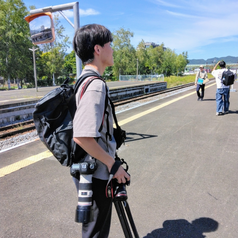 A train buff with LOTS of camera gear